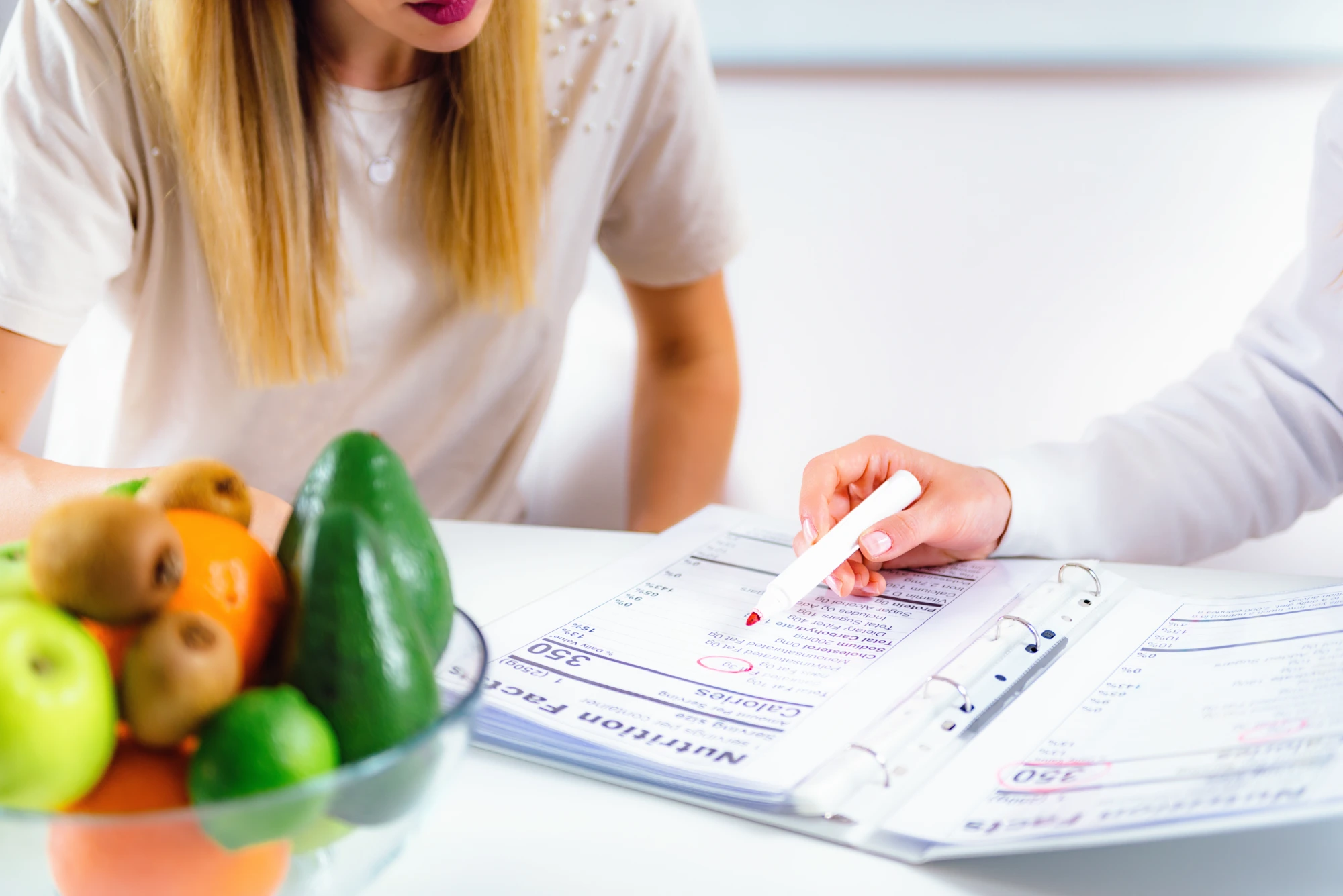 Diet consultation with fruits and nutrition plan.